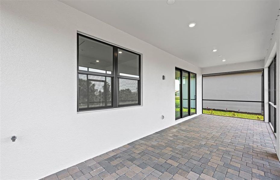 Exterior details and patio area of a home in Talon Preserve on Palmer Ranch, Nokomis (Image 21).