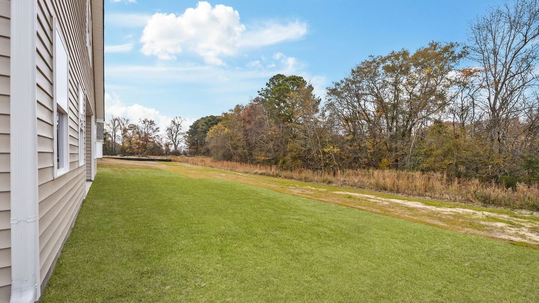 Exterior details and patio area of a home in Villa Grande, Winterville (Image 20).