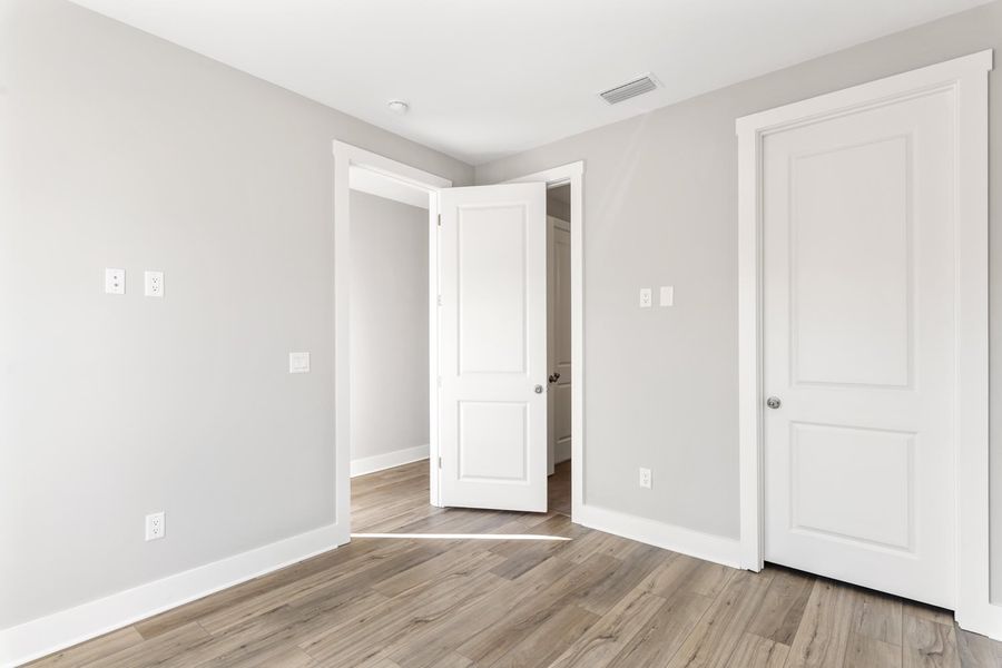 Representative unfurnished interior of a home built from the Pearl by Brock Built in Nautilus Pointe, Inlet Beach (Image 15).