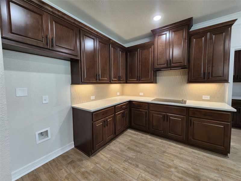 A well-appointed kitchen boasts sleek countertops and abundant cabinetry for all your culinary needs. A well-appointed kitchen boasts sleek countertops and abundant cabinetry for all your culinary needs.