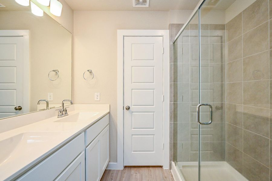 Furnished interior view inside a new home in Mustang Crossing, Alvin (Image 6).