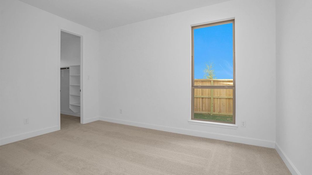 Spacious, unfurnished interior of a new home in Elyson 55', Katy (Image 7).