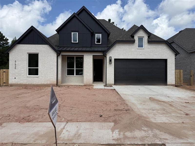 Front exterior of a new home in COLTON: 60ft. lots, Magnolia, TX, highlighting curb appeal (Image 2).