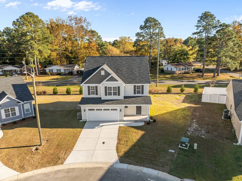 Front exterior of a new home in Arbor Hills South, Greenville, NC, highlighting curb appeal (Image 21). Front exterior of a new home in Arbor Hills South, Greenville, NC, highlighting curb appeal (Image 21).