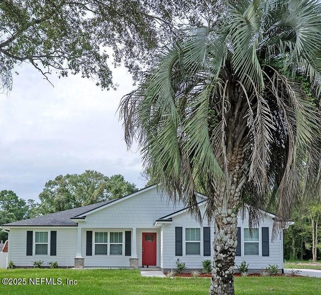 Front exterior of a new home in , Jacksonville, FL, highlighting curb appeal (Image 1). Front exterior of a new home in , Jacksonville, FL, highlighting curb appeal (Image 1).