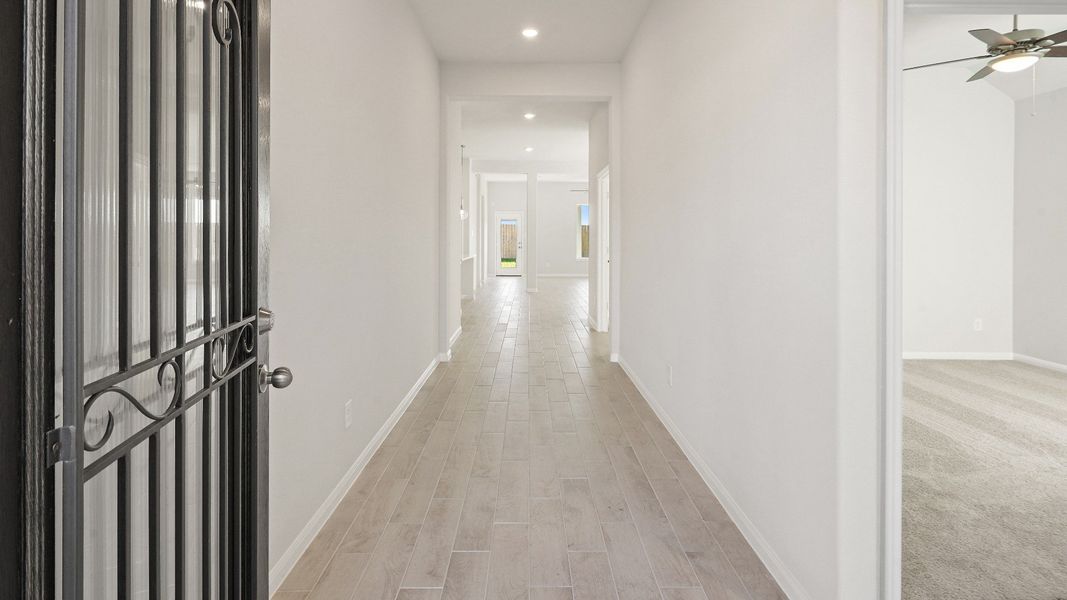 Representative unfurnished interior of a home built from the The Benbrook by Legend Homes in Bluestem, Brookshire (Image 9).