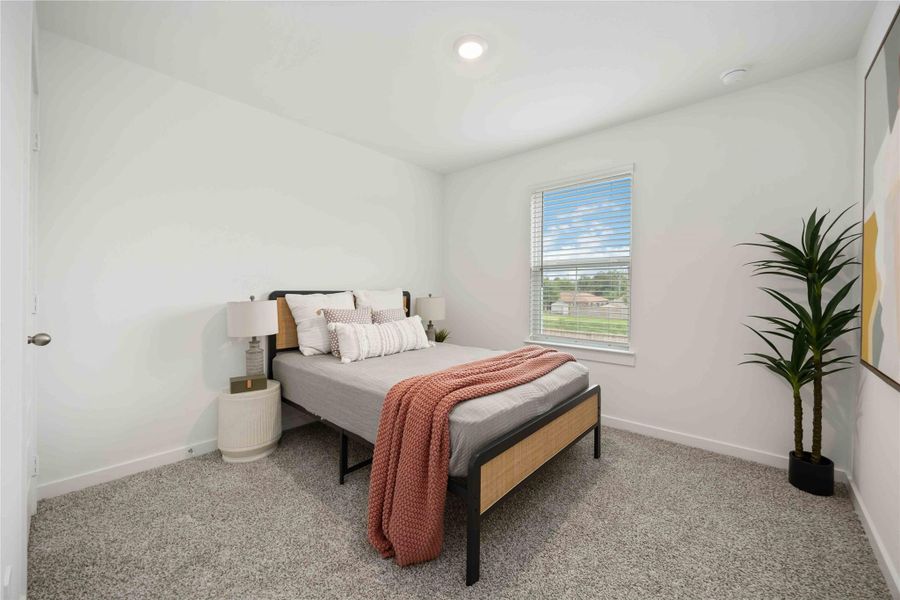 Furnished interior view inside a new home in Grand West, Houston (Image 9).