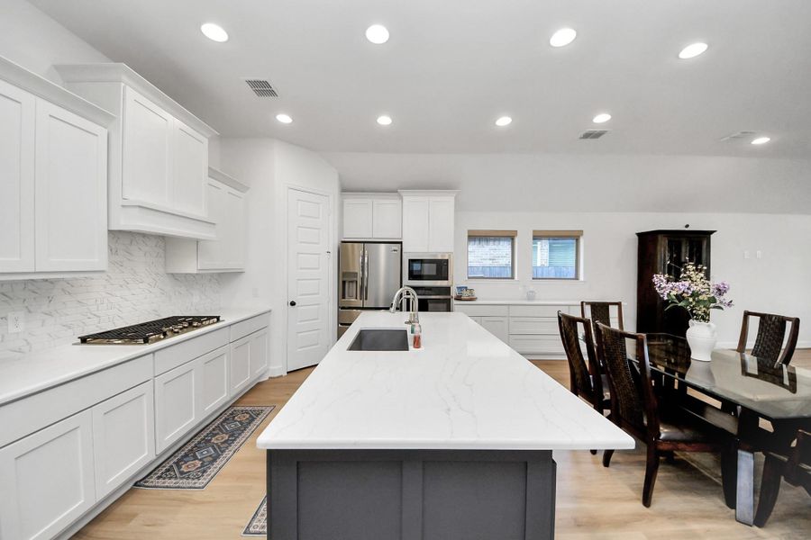 Kitchen with island, upgraded built in cabinets Kitchen with island, upgraded built in cabinets