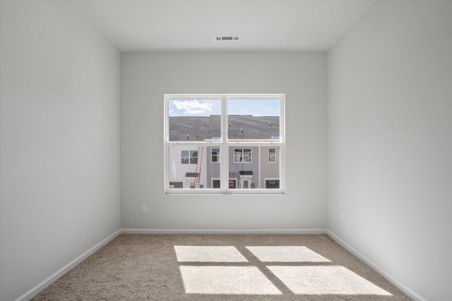 Spacious, unfurnished interior of a new home in Renaissance at White Oak, Garner (Image 23).