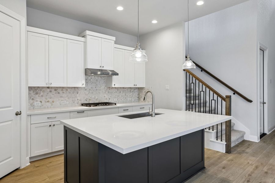 Furnished interior view inside a new home in 6 Creeks, Kyle (Image 5).