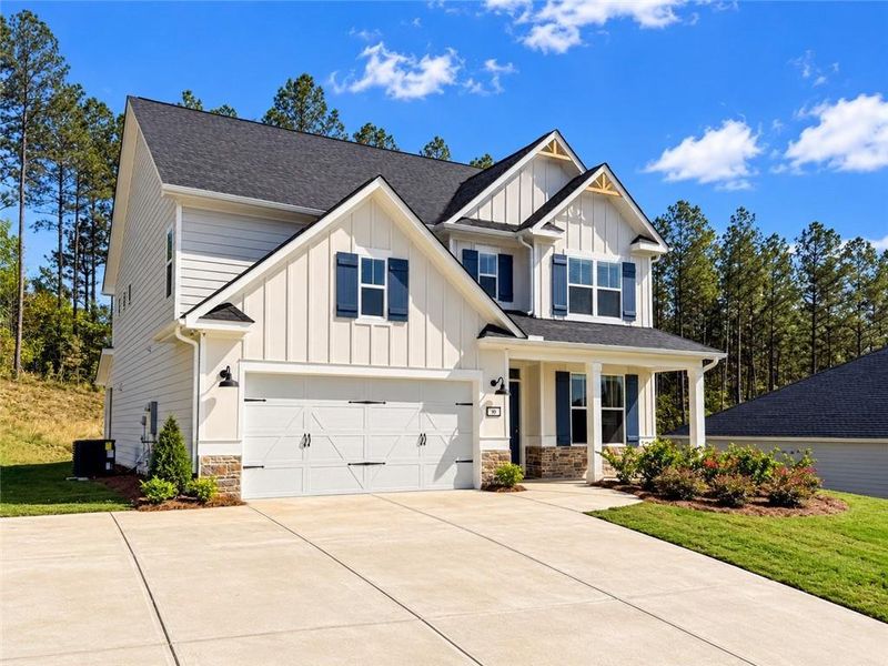 Front exterior of a new home in , Dallas, GA, highlighting curb appeal (Image 24).
