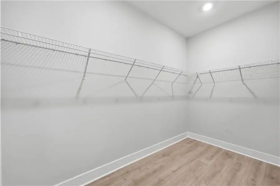 Ample wire shelving lines this functional closet s