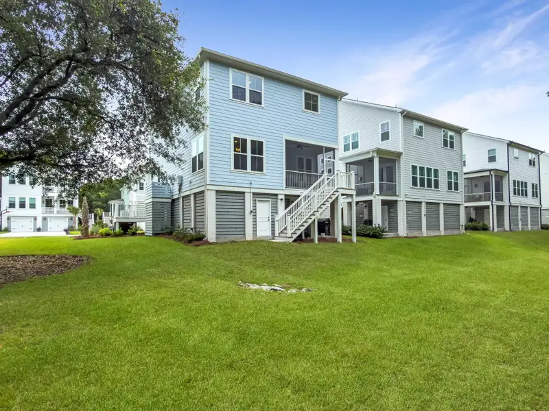 Exterior details and patio area of a home in Overlook at Copahee Sound, Awendaw (Image 3).