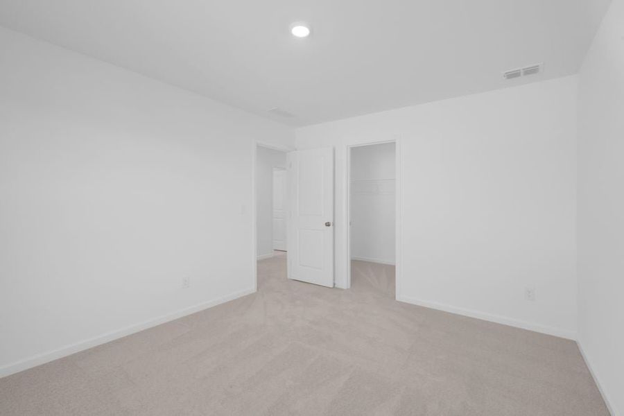 Spacious, unfurnished interior of a new home in Windance Lake, Loganville (Image 23).