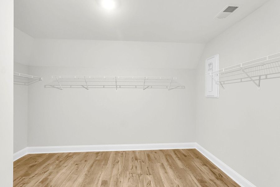 Spacious, unfurnished interior of a new home in Tidewater at Lakes of Cane Bay, Summerville (Image 23).