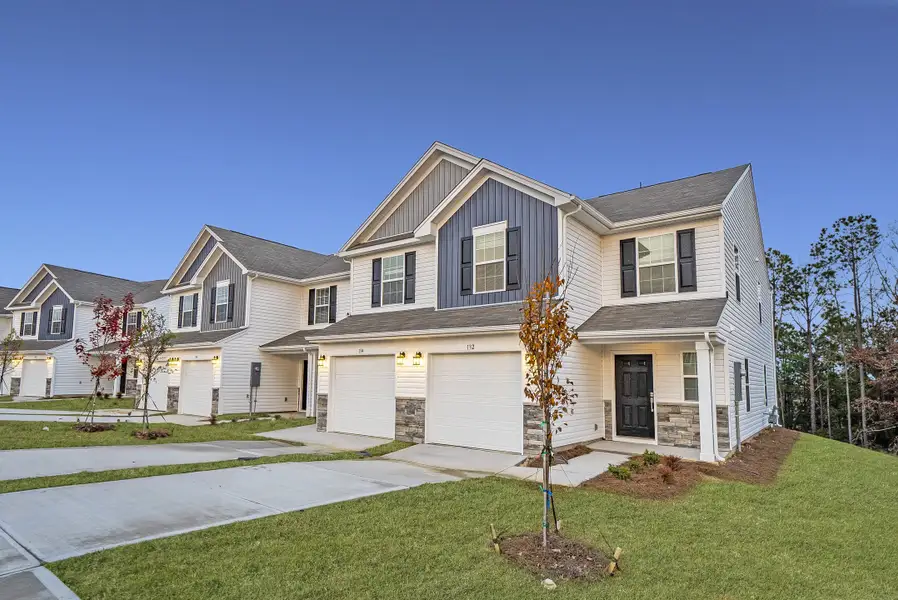 Front exterior of a new home in Point at Chestnut Hills Place, Columbia, SC, highlighting curb appeal (Image 1).