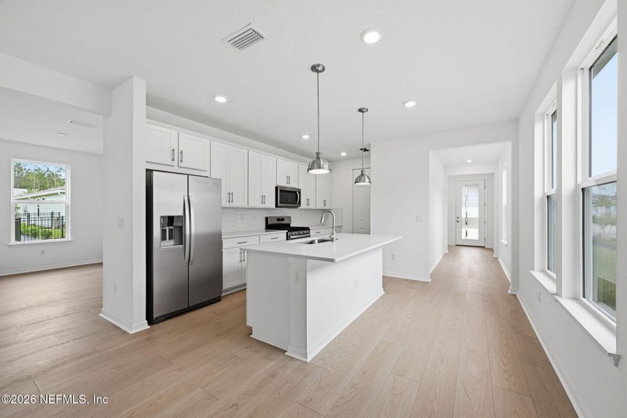 Furnished interior view inside a new home in Del Webb Wildlight, Yulee (Image 8).