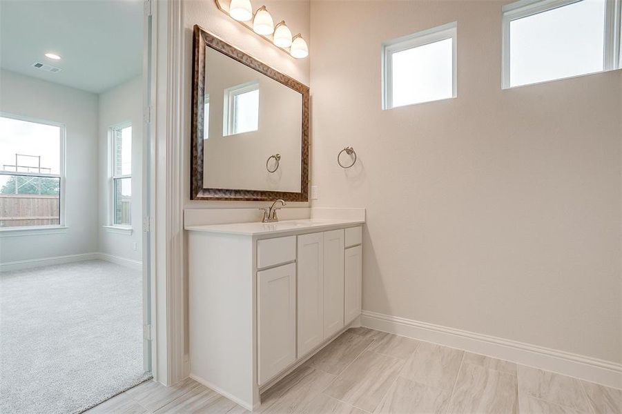 Bathroom featuring vanity