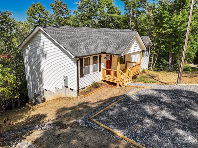 Front exterior of a new home in , Etowah, NC, highlighting curb appeal (Image 18).