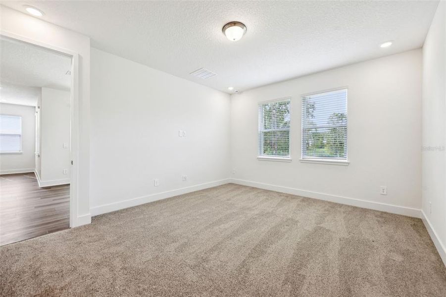 Spacious, unfurnished interior of a new home in Ridgehaven - Signature Series, Ormond Beach (Image 31).