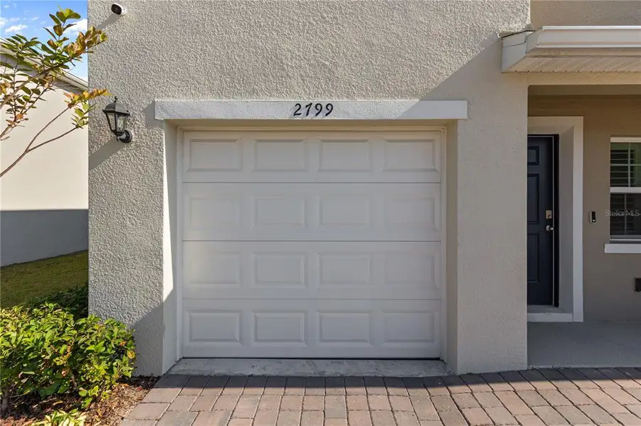 Exterior details and patio area of a home in Harmony West, St. Cloud (Image 4).