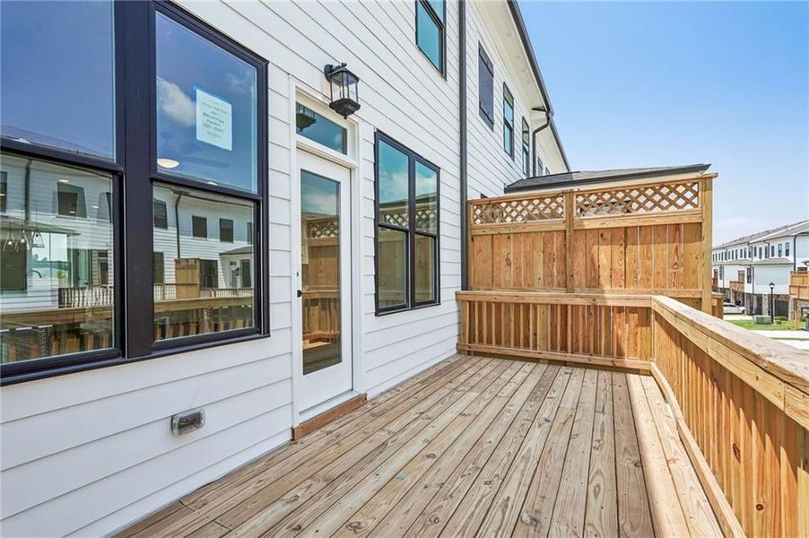 Exterior details and patio area of a home in Millcroft Townhomes, Buford (Image 36). Exterior details and patio area of a home in Millcroft Townhomes, Buford (Image 36).