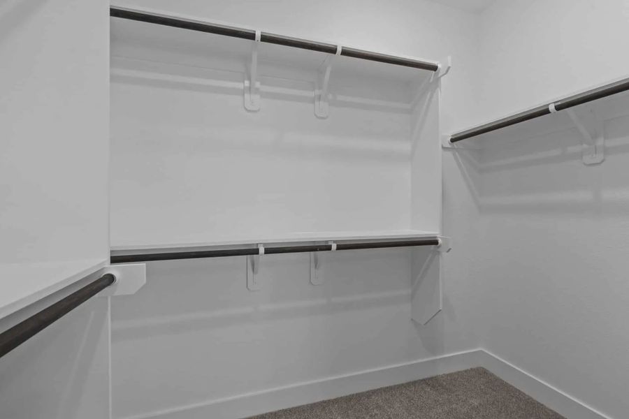Representative unfurnished interior of a home built from the Carriagehouse by Chesmar Homes in Meridiana Townhomes, Iowa Colony (Image 77).