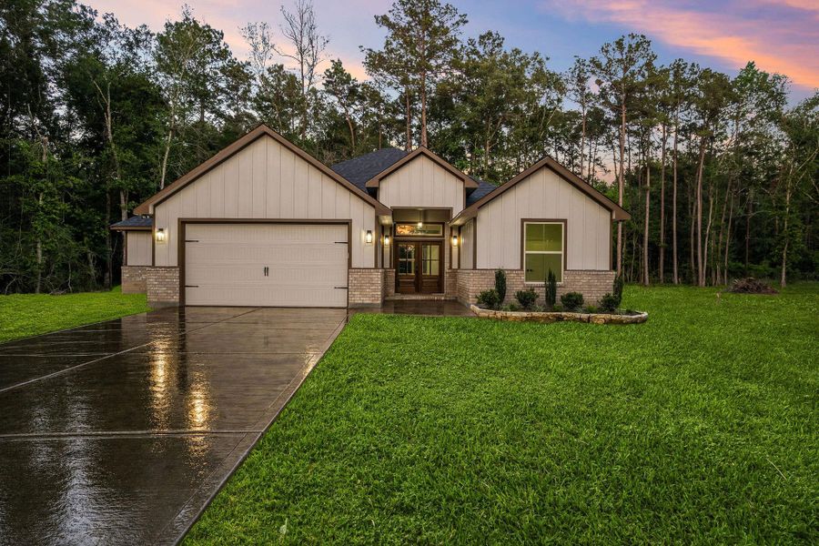 Front exterior of a new home in , Porter, TX, highlighting curb appeal (Image 22).