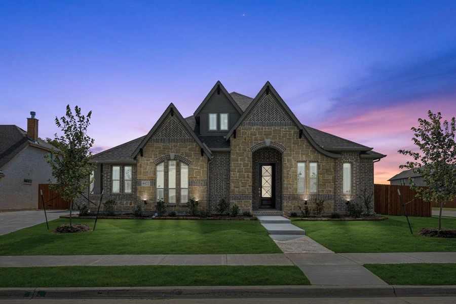 Front exterior of a new home in Ridgepoint, Midlothian, TX, highlighting curb appeal (Image 27).