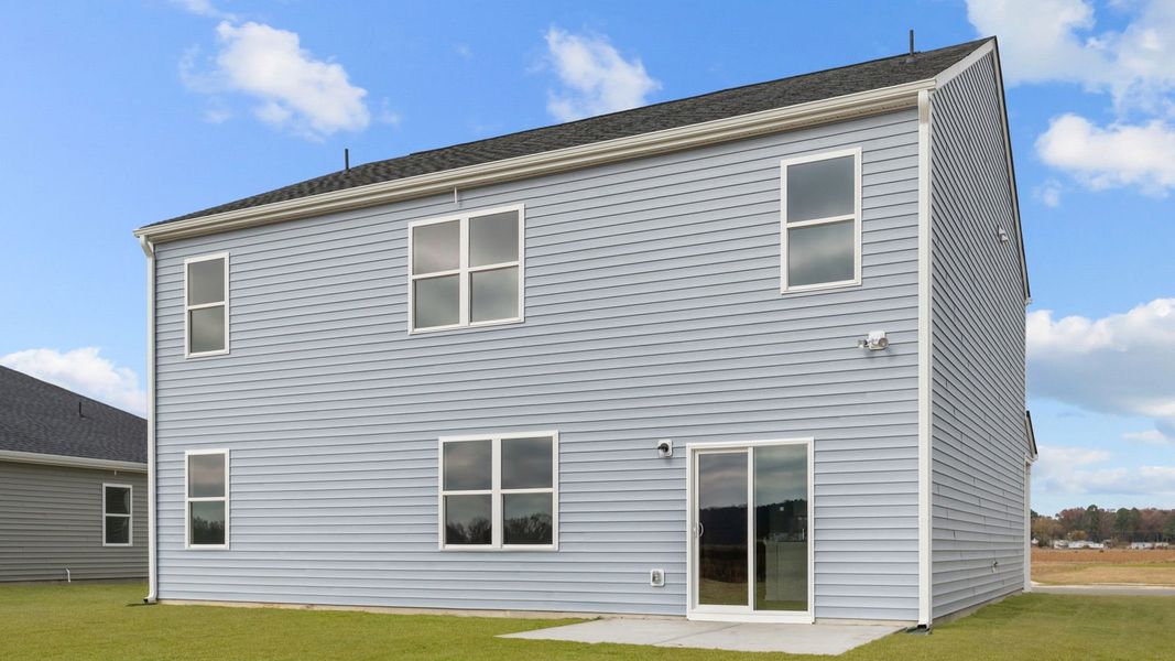 Exterior details and patio area of a home in East Ridge, Ayden (Image 19).