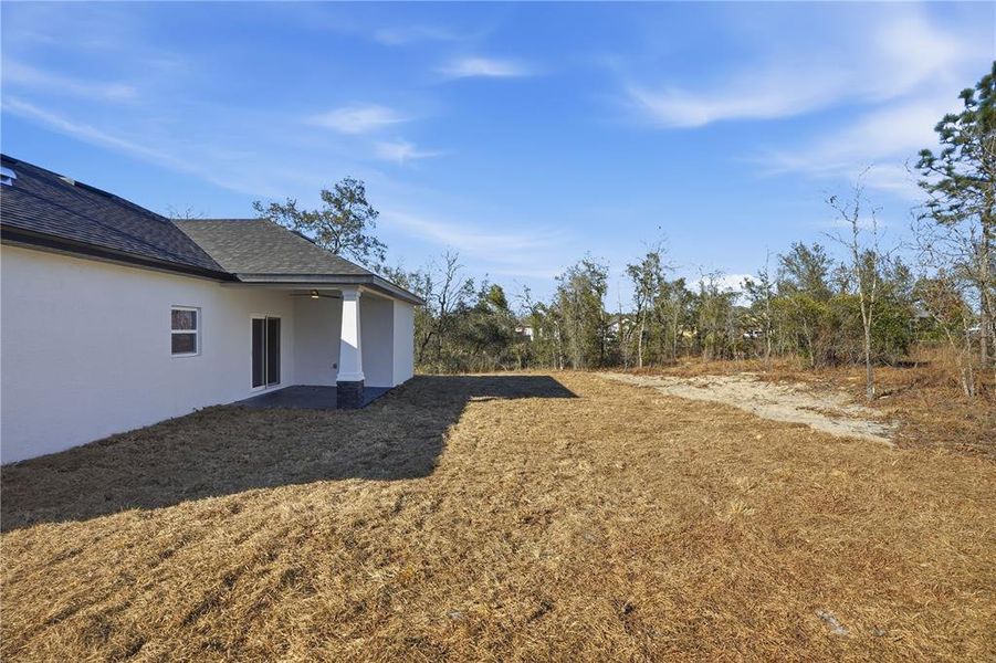 Exterior details and patio area of a home in , Brooksville (Image 4).