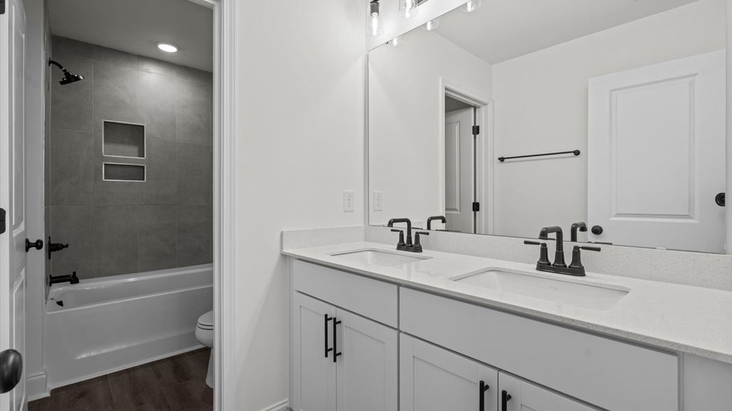 Representative furnished interior of a home built from the Ansley by DRB Homes in Sidney Creek Single Family, Zebulon (Image 56).