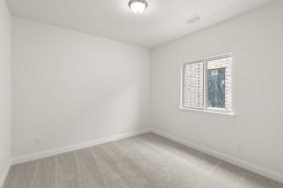 Spacious, unfurnished interior of a new home in The Reserve at Spiritas Ranch, Little Elm (Image 27).