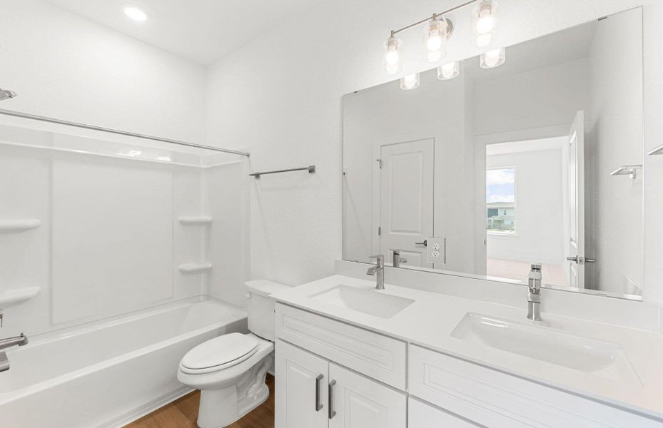 Furnished interior view inside a new home in Northpoint at Old Settlers, Round Rock (Image 17). Furnished interior view inside a new home in Northpoint at Old Settlers, Round Rock (Image 17).