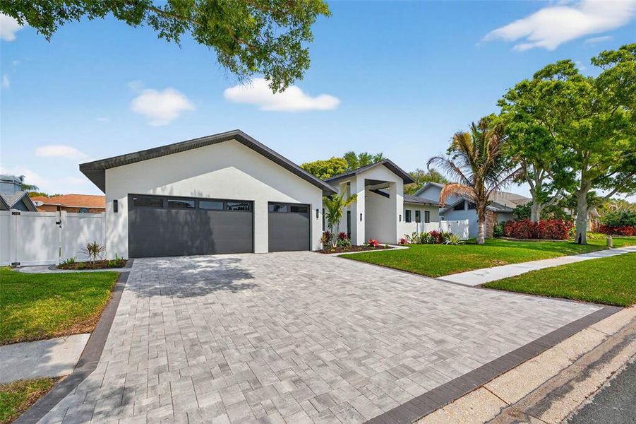 Front exterior of a new home in , Largo, FL, highlighting curb appeal (Image 28). Front exterior of a new home in , Largo, FL, highlighting curb appeal (Image 28).