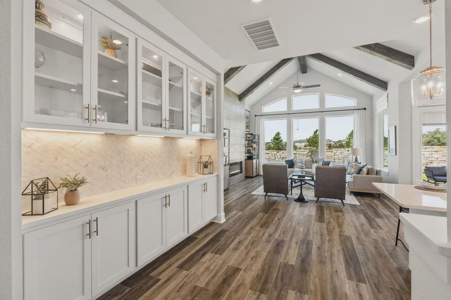 Representative furnished interior of a home built from the Mia by Chesmar Homes in Sweetwater, Austin (Image 5).