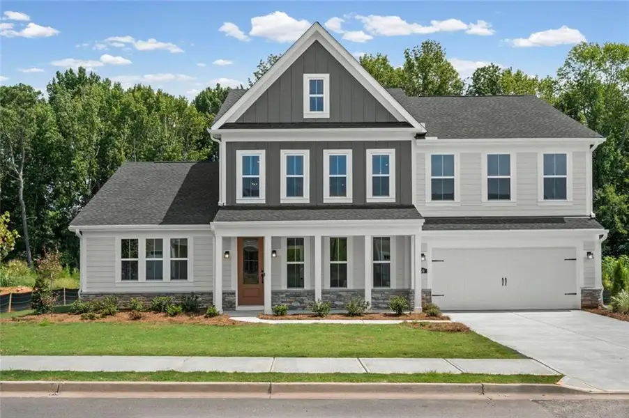 Front exterior of a new home in Hidden Fields, Hoschton, GA, highlighting curb appeal (Image 19).