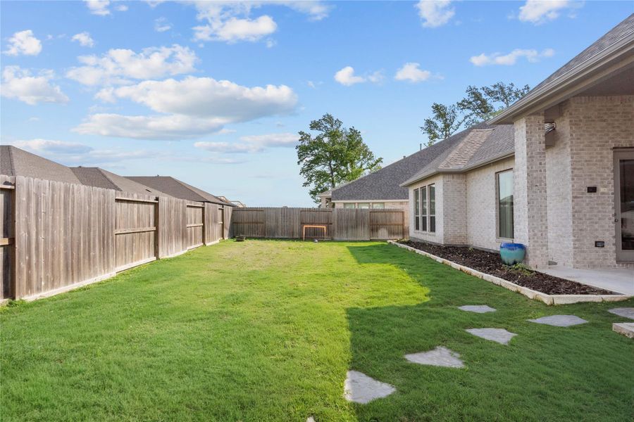 Exterior details and patio area of a home in Riceland, Mont Belvieu (Image 22).