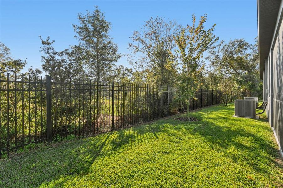 Exterior details and patio area of a home in Villas Del Lago, Lutz (Image 3).