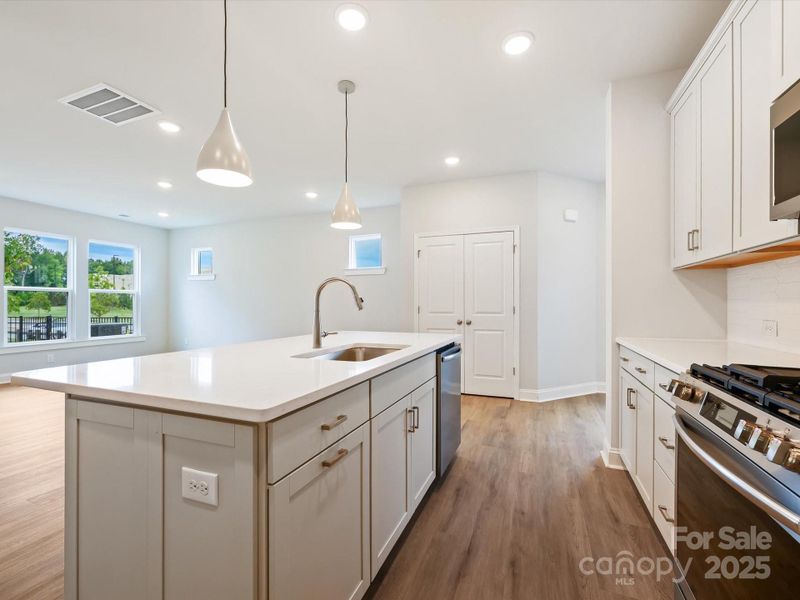 Furnished interior view inside a new home in North Creek Village - Townhomes, Huntersville (Image 6). Furnished interior view inside a new home in North Creek Village - Townhomes, Huntersville (Image 6).