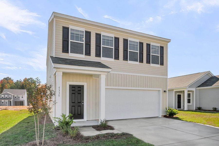 Representative exterior photo of a completed home built from the Voyager by Starlight Homes in Watson Hill, Summerville, SC (Image 26).