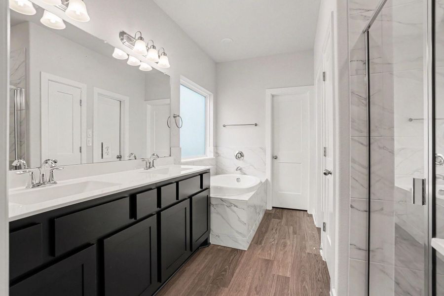 Furnished interior view inside a new home in Clear View Estates, Willis (Image 7).
