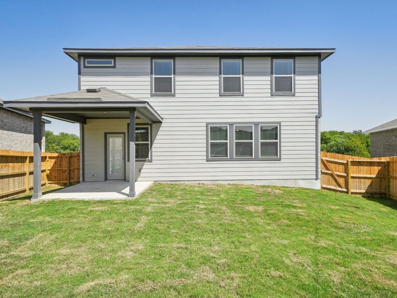 Back exterior of the Red River floorplan at a Meritage Homes community.