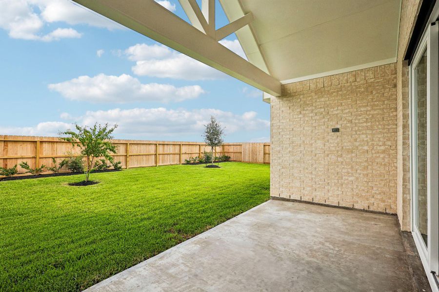 Relax outdoors on the covered patio Relax outdoors on the covered patio