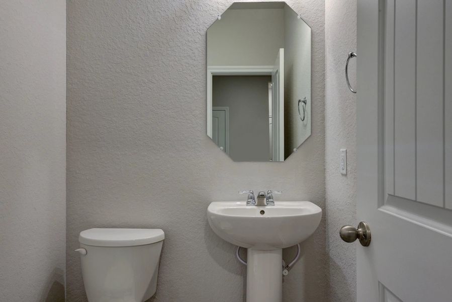 Representative furnished interior of a home built from the Devon by Ashton Woods in Cordova Trails, Seguin (Image 13).