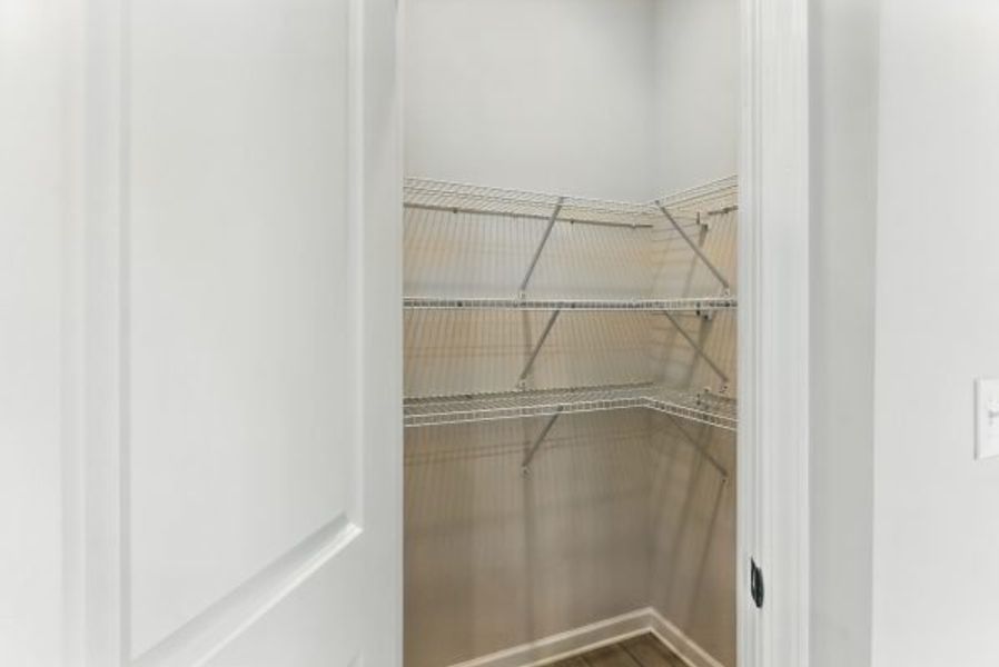 Representative unfurnished interior of a home built from the Brentwood by Piedmont Residential in Falls Creek, Flowery Branch (Image 19).