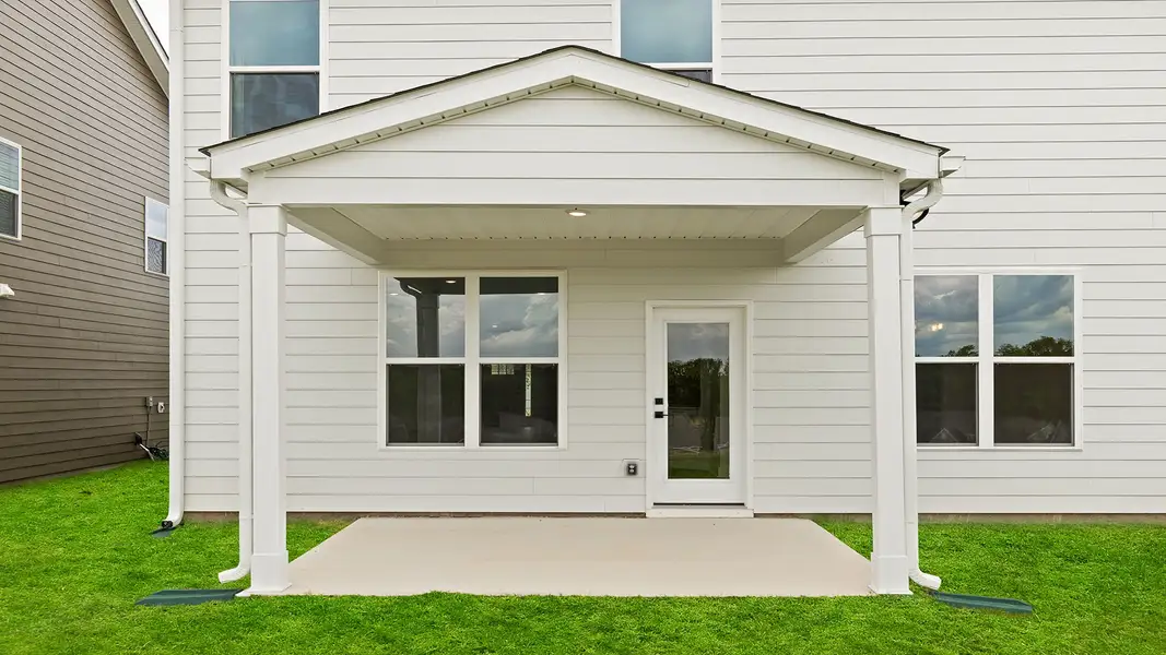 Exterior details and patio area of a home in Sycamore Cove, Woodruff (Image 4).