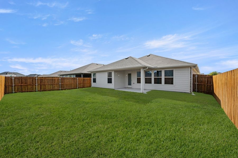 Front exterior of a new home in Terra Vella, Haslet, TX, highlighting curb appeal (Image 26).