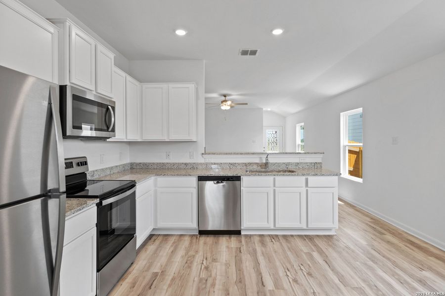 Furnished interior view inside a new home in Blue Wing, San Antonio (Image 4).