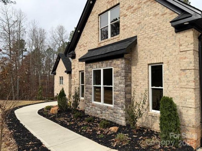 Exterior details and patio area of a home in , Lincolnton (Image 15).